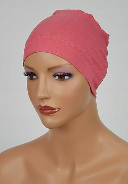 Turbante oncológico rosa de Eva Design, ideal para comodidad y estilo en pacientes de quimioterapia