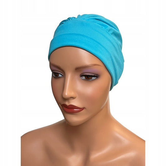 Turbante oncológico bambú en color azul claro, suave y cómodo, ideal para tratamientos de quimioterapia